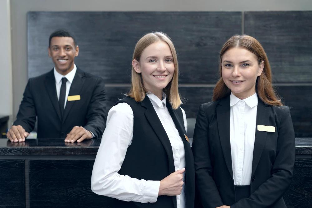 Receptionists working in elegant suits